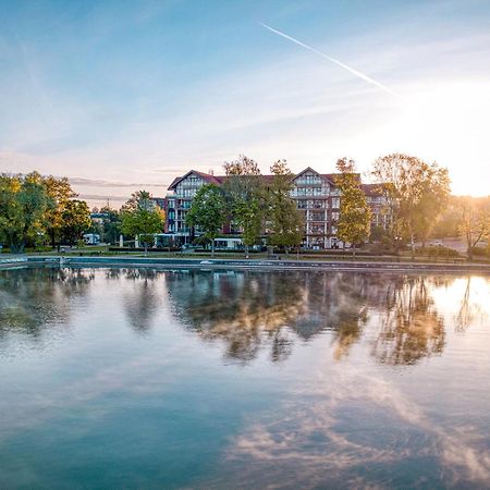 Willa Port Острода Екстер'єр фото The lake at the campus of the University of Applied Sciences and Medical University of Southern Tyrol
